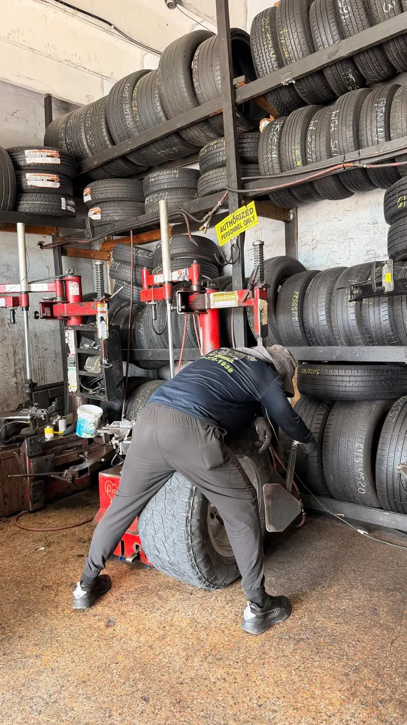 New and used tire racks inside the shop