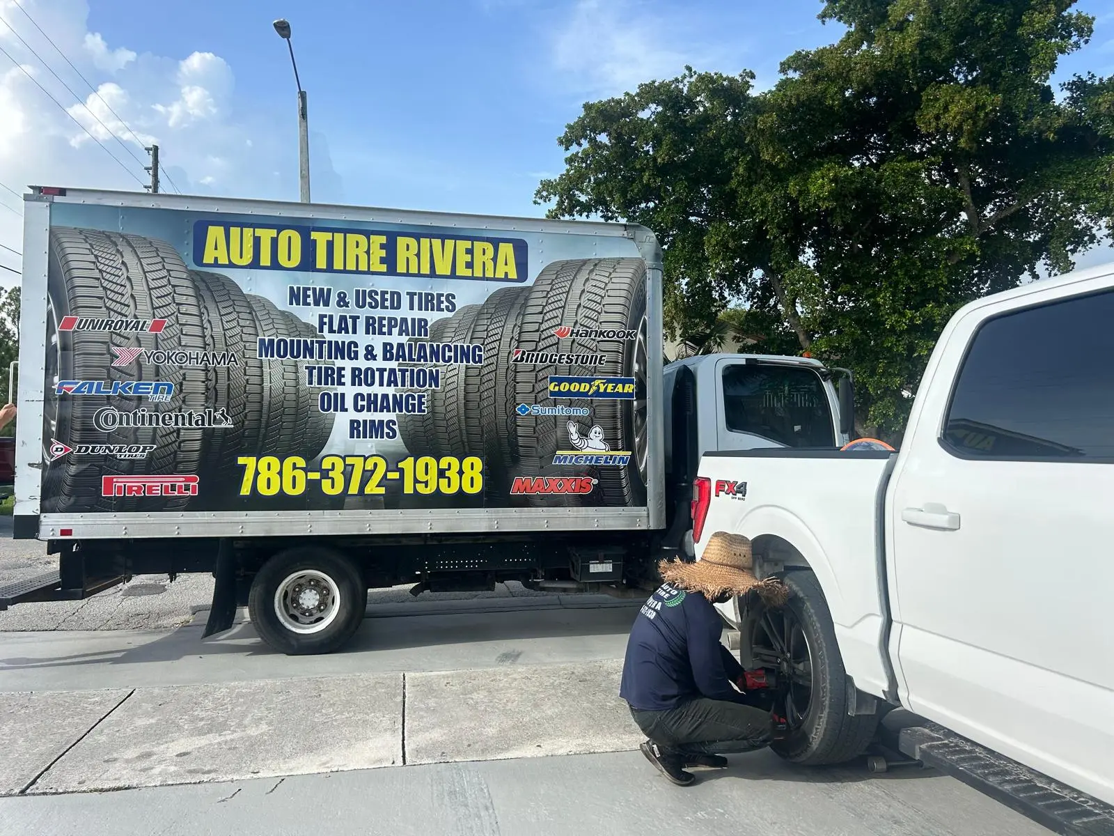 The mobile van on-site while a pickup gets fresh tires