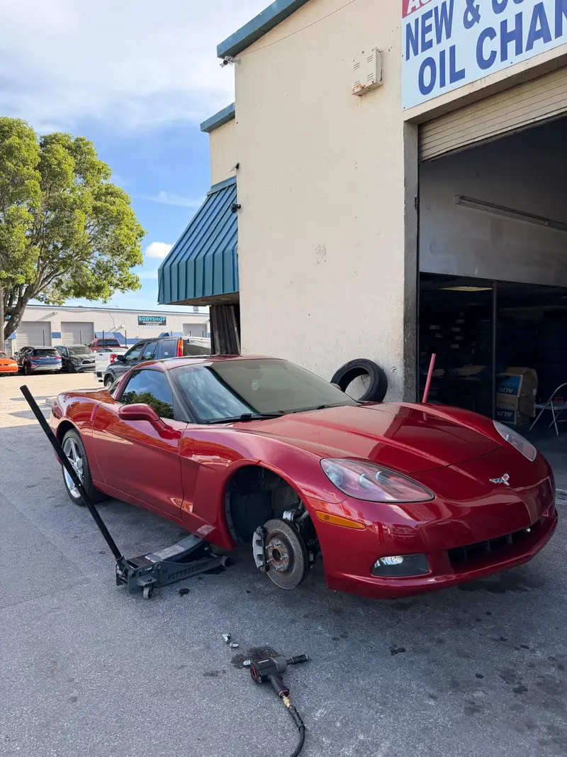 Corvette getting tire service at the SW 107th Ave bays